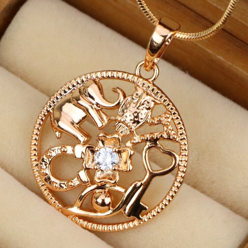 "Round Rose Gold Pendant with Religious Motifs and Center Stone, XPPT1442